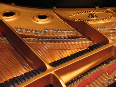 No, the Steinway grand piano is not mine.