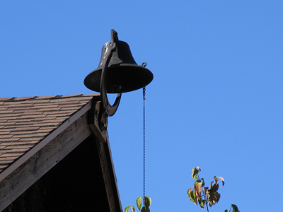 It used to be on a pole in the front yard.  I guess it too many unauthorized people rang it.