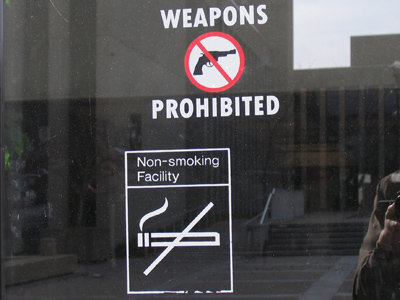 No smoking or guns?  If I stay inside this building all the time, I could live forever.