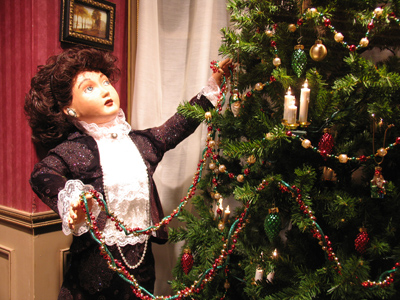 My girlfriend came over to help me trim the tree.