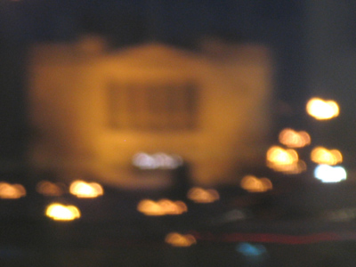 Seen through a glass darkly.