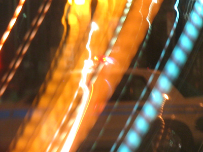 A cop car through the windshield.