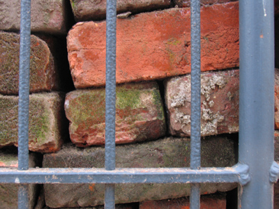 `Between a rock and a hard place` doesn`t quite fit here, but close.