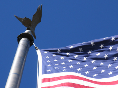 SPANGLE (verb): To emit light suddenly in rays or sparks.