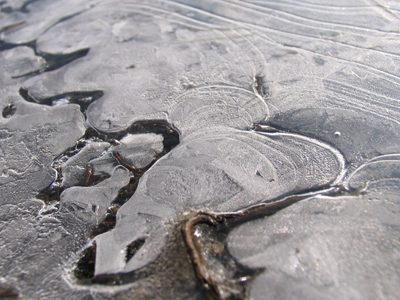 It weakens and cracks as it slowly melts into memory.