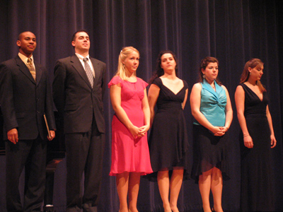 `American Idol` it ain`t.  The soprano on the right won.