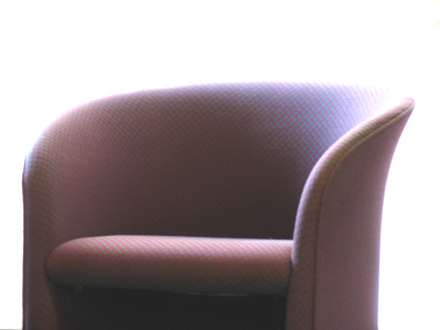 On the sunny side of the seat.