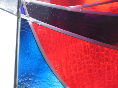 Stained glass in the Chapel of the Marianist Martyrs.  Note the blue glass . . . 