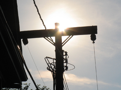 Summer solstice:  the rising sun lines up perfectly with the telephone pole in the alley.