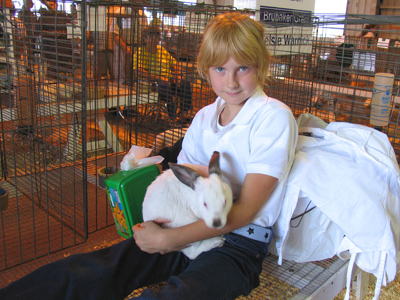The kids don`t give names to their fair animals, knowing what their ultimate fate will be.