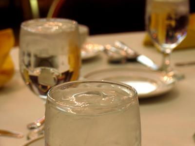 I see an upside-down coffee cup in the water glass.