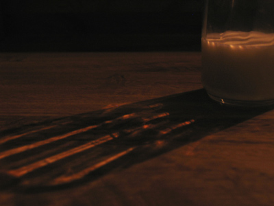 A glass of milk illuminated by a Christmas candle in the window -- obviously.