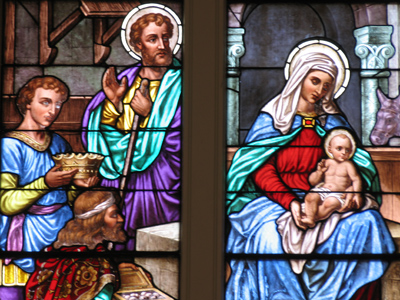 Adoration of the Magi in stained glass.