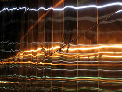 The Brillo building at night.  Nothing in the shot was moving, it just reflects light this way.