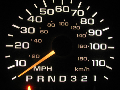 I drive in kilometers per hour.  That way I can go 100.