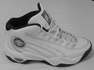 It demonstrates how a camera tries to make everything (white or black or in between) a shade of gray.