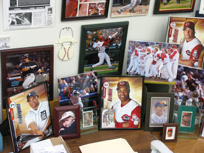 A coworker had me take a picture of her Reds shrine, so she could put it back together when she got a new desk.