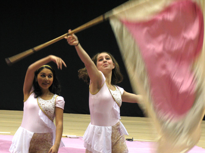 Favorite: a no-look flag toss to a teammate, who catches it in one hand.  Least favorite: music with sappy dialogue.