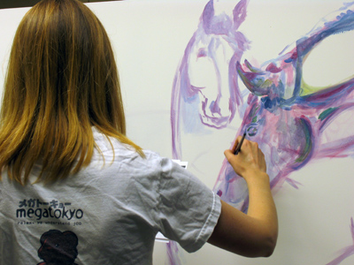 Sinclair Community College, 7:22pm - student making horse picture.