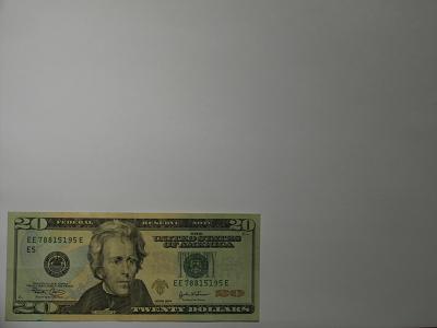 Take your avaricious eyes off the twenty for a second, this is important.  The background of this image is WHITE.