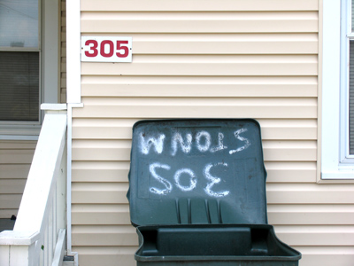 Rent is cheaper in the green apartment.