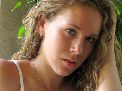 The year this brown-haired, white-dressed person on earth was born, Ronald Reagan began his second term.