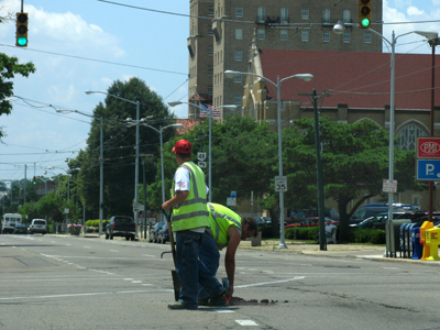 The lights are green, traffic`s flying by, they`re digging in the middle of the street, with eyes like frightened animals.