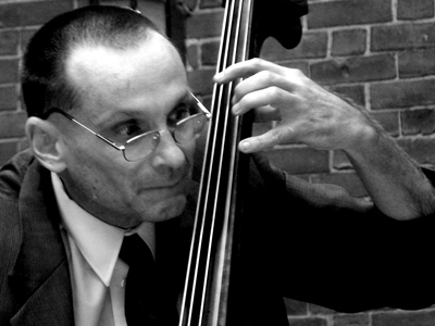 Then DURING the second song he handed me HIS camera and asked me to `Take a few shots of the band`!