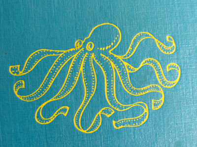 The logo of the late oceanographer Jacques Cousteau.  Are those sprockets holes?