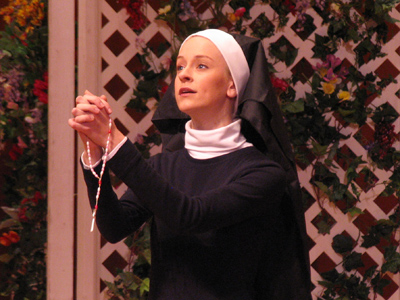 An unusually devout Puccini heroine.