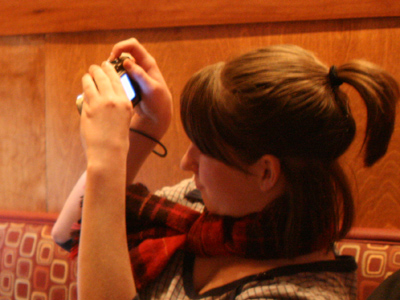 A common sight when a photo class goes out for pizza.