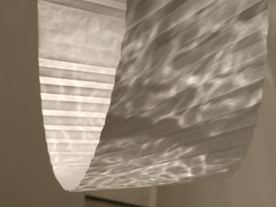 Folded paper and reflections from mylar.