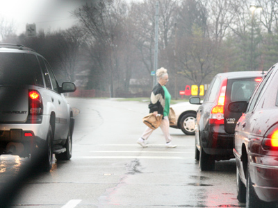 Look out for that giant windshield wiper!  At this moment, the radio was playing `Feel the rain on your skin.`