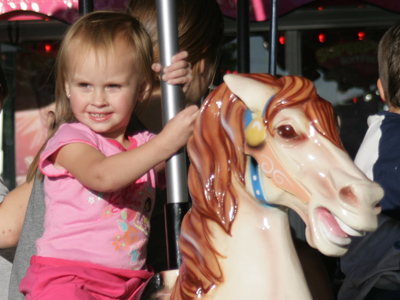 She rides an old paint.