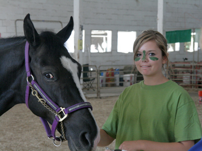 After grooming a muddy horse, the contestants usually come away with dirty faces.