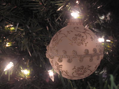 Fake tree, fake candles, fake presents underneath.