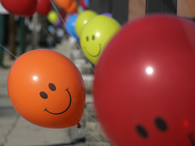 I saw the balloons and suddenly had the irresistible urge to buy a used car.