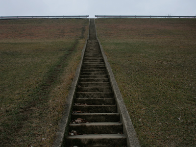 Trust me, it`s not worth the climb.  There`s a road up there.