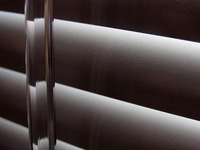 The wind has the same effect on grass that it has on sand.