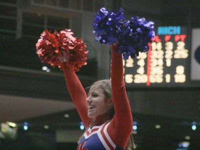 The cheerleaders whipped the crowd of not-quite-500 people into a frenzy.