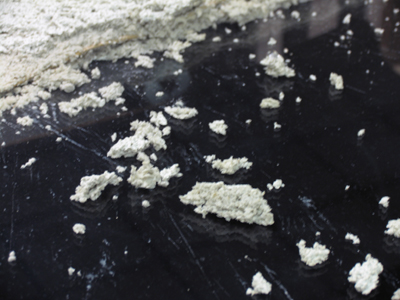 Don`t worry, those wet ceiling tiles falling around you contain only small amounts of asbestos.