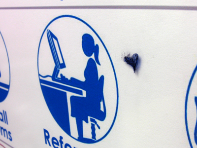 Remember my elevator sign from September 18, 2007?  Someone loves the pony-tailed computer user icon.