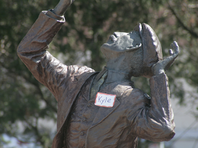 While Wilbur and Orville flew the airplane, Kyle Wright encouraged them from the ground.