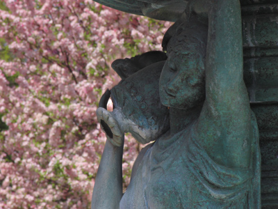 The boa constrictor spent the rest of the photo session waiting impatiently inside a garbage can.