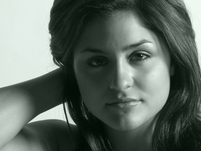 Surrounded by technology, she`s studying with handwritten index cards.