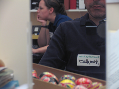 Killing time before the art exhibition opens.