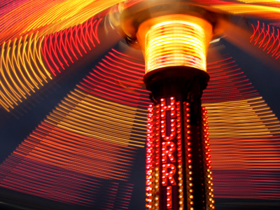 I walked by later and somebody was being hauled off this ride into an ambulance.  Woo-hoo!  Fun times at the fair!