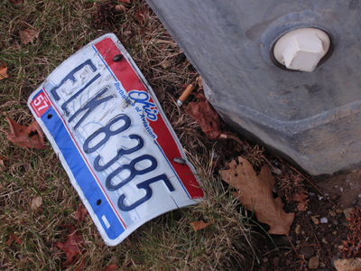 There were little bits of broken car in the intersection.