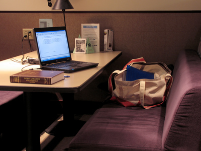 A student`s standard equipment:  laptop computer and bookbag.