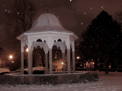 Outside in the snow with a camera and flash.  What will the neighbors think?
